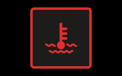Symbole de température moteur : le voyant liquide de refroidissement s'allume, indiquant une surchauffe.