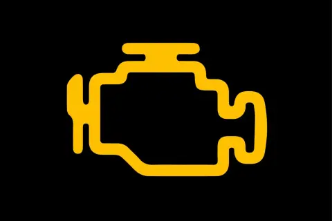 Voyant moteur orange clignote sur fond noir. Un problème mécanique est à signaler.
