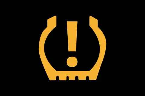 Voyant pression pneu reste allumé Toyota Yaris : le témoin jaune en forme de pneu crevé avec un point d'exclamation indique un problème de sous-gonflage.