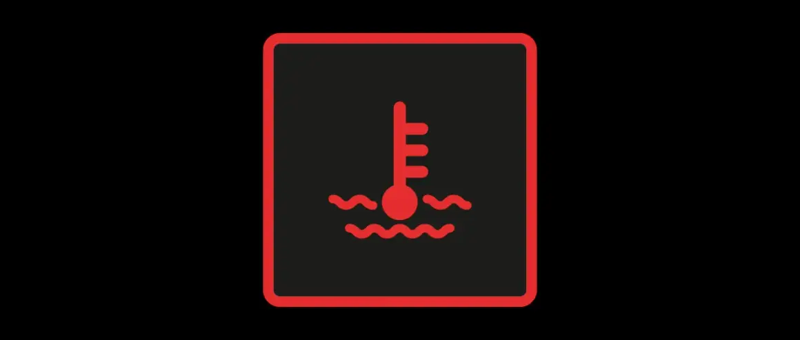 Symbole de température moteur : le voyant liquide de refroidissement s'allume, indiquant une surchauffe.