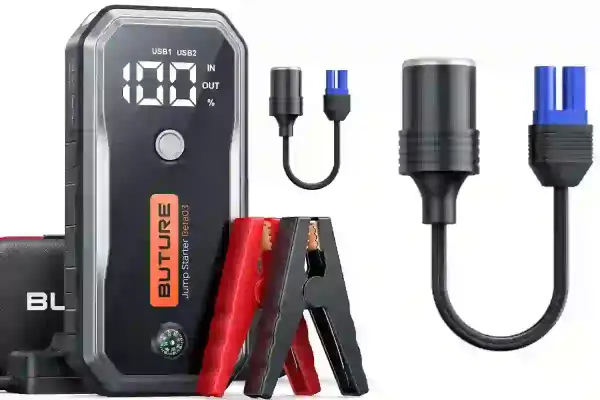 Booster de batterie avec pinces rouges et noires, et câbles pour savoir comment recharger un booster de batterie.